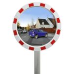 Illustration d'un miroir industriel économique rond accroché à un poteau vue de face