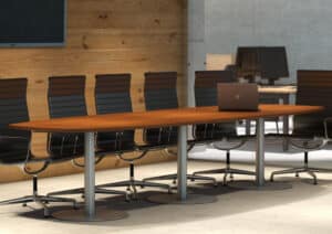 Photo d'une table de conférence plateau mélaminé 3 pieds tube acier avec platine dans une salle de réunion