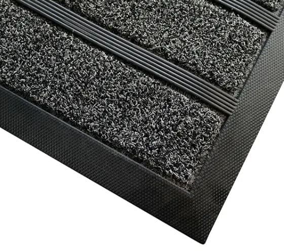 Photo d'un coin de tapis grattant pro extérieur gris