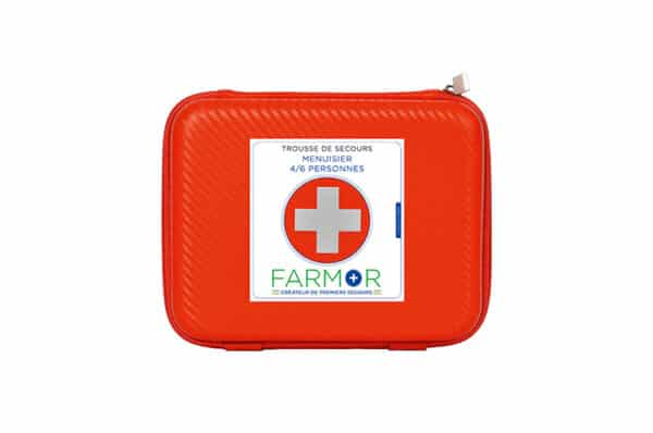 Photo d'une trousse de secours rouge couvreur étancheur 4/6 personnes