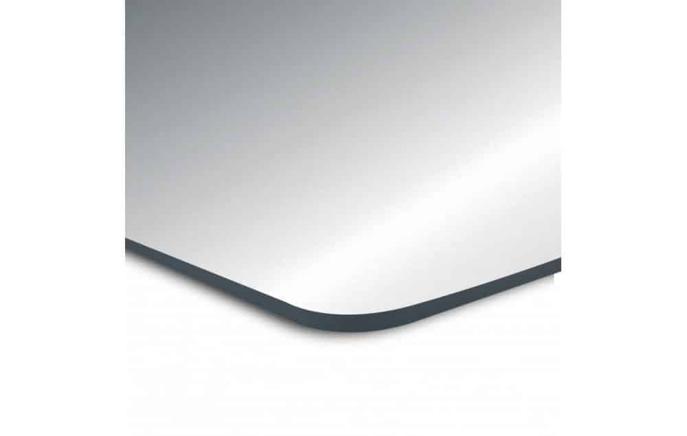 Photo du coin d'un miroir plat pour sanitaire