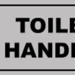 Photo d'un panneau pvc adhésif toilettes handicapées