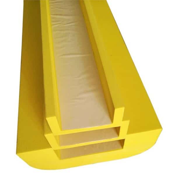 Photo d'une protection industrielle en mousse jaune vue d'en dessous