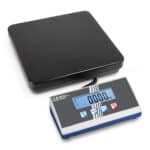 Photo d'une petite balance professionnelle pour colis